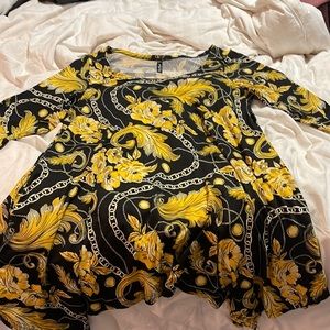 Black and gold top